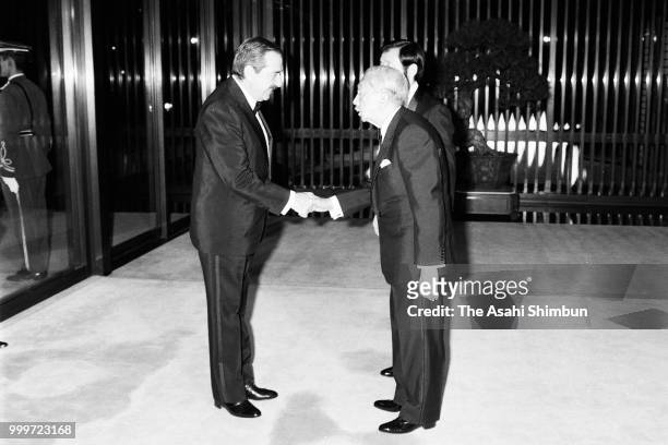 Argentina President Raul Alfonsin is welcomed by Emperor Hirohito prior to the state dinner at the Imperial Palace on July 14, 1986 in Tokyo, Japan.
