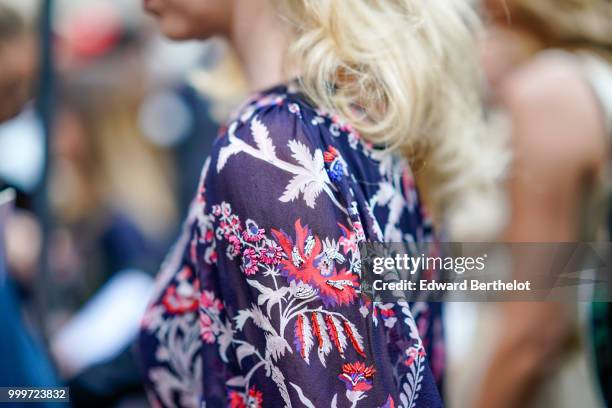Guest wears a flower print top, outside Dior, during Paris Fashion Week - Menswear Spring-Summer 2019, on June 23, 2018 in Paris, France.