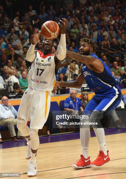 Germany's Dennis Schroeder in action against Israel's Richard Howell during the EuroBasket 2017 Group B game between Germany and Israel in the...