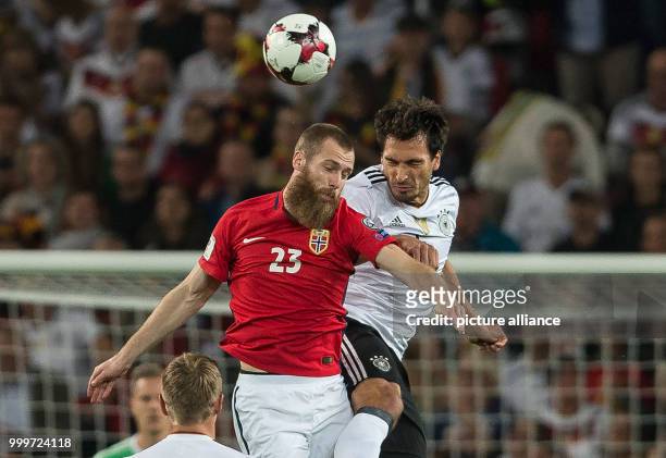 Germany's Mats Hummels and Norway's Haitam Aleesami vie for the ball during the soccer World Cup qualification group stage match between Germany and...