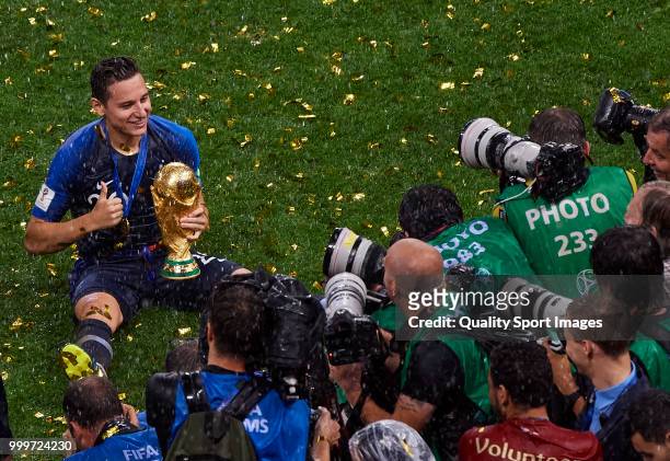 Florian Thauvin of France celebrates with the trophy after the 2018 FIFA World Cup Russia Final between France and Croatia at Luzhniki Stadium on...