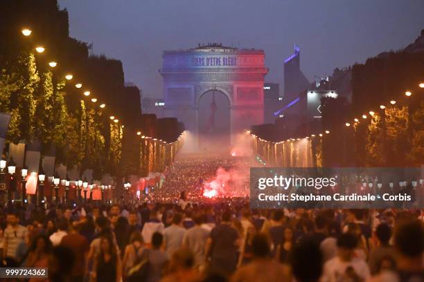 General view of the Champs Elysees with the Arc de Triomphe as the fans celebrate the Victory of France in the World Cup 2018, on July 15, 2018 in...