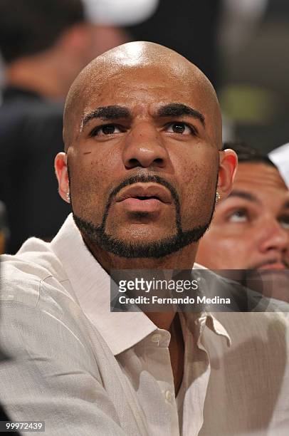 Carlos Boozer of the Utah Jazz watches the game between the Boston Celtics and the Orlando Magic in Game Two of the Eastern Conference Finals during...