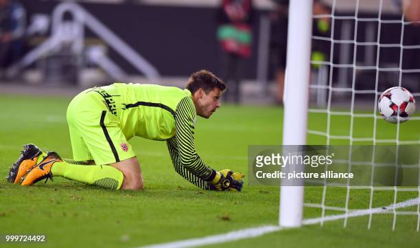 Norway's goalkeeper Rune Jarstein looks to the ball during the soccer World Cup qualification group stage match between Germany and Norway in the...