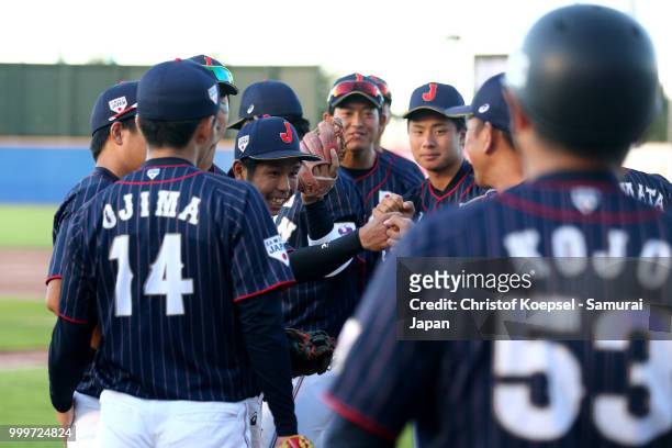 The team of Japan celebrates during the Haarlem Baseball Week game between Cuba and Japan at Pim Mulier Stadion on July 15, 2018 in Haarlem,...