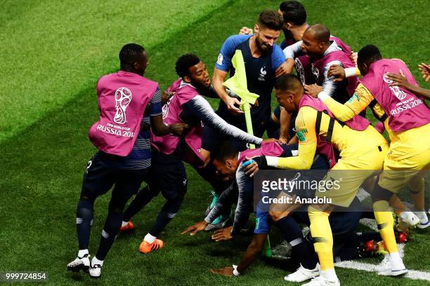 Paul Pogba of France celebrates with his teammates after scoring a goal during the 2018 FIFA World Cup Russia final match between France and Croatia...