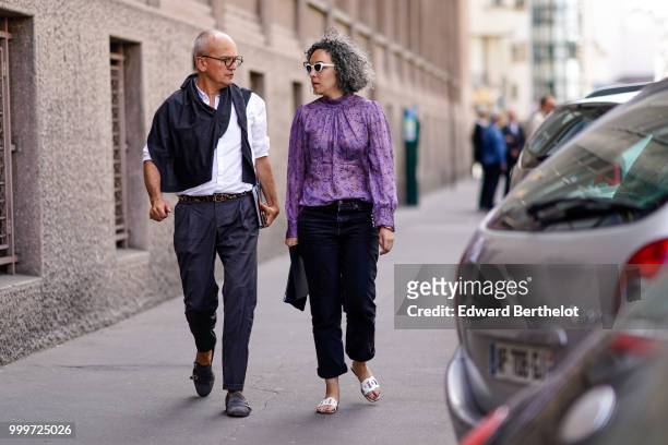 Guest wears a purple shirt, outside Wooyoungmi, during Paris Fashion Week - Menswear Spring-Summer 2019, on June 23, 2018 in Paris, France.