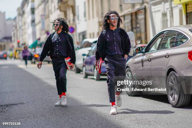Twins are seen, outside Wooyoungmi, during Paris Fashion Week - Menswear Spring-Summer 2019, on June 23, 2018 in Paris, France.
