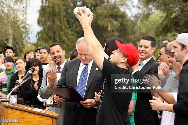 Councilmember Tom LaBonge speaks onstage as Pro Skatboarder Rob Dyrdek unveils 7-Eleven Urban Skate Store and opens "Safe Spot Skate Spot", funded by...