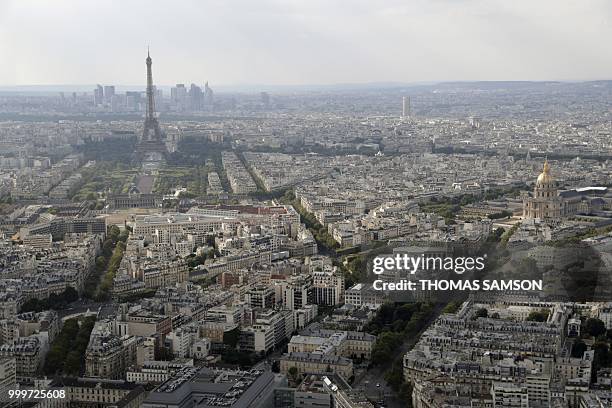 This picture taken from the panoramic observatory of the Montparnasse Tower shows a view of the fan zone on the Champs de Mars near the Eiffel Tower...