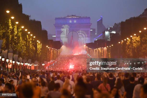 General view of the Champs Elysees with the Arc de Triomphe as the fans celebrate the Victory of France in the World Cup 2018, on July 15, 2018 in...