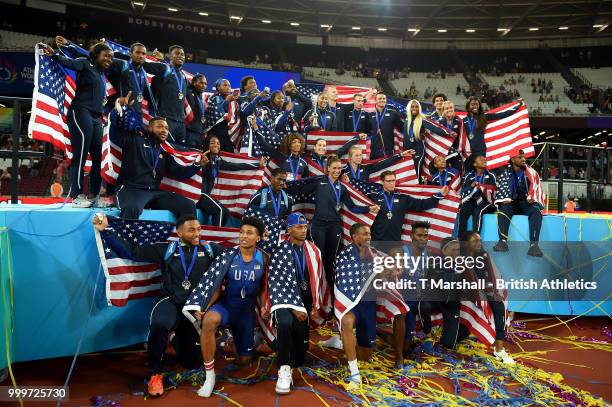 Team USA celebrate as they lift the platinum trophy during day two of the Athletics World Cup London at the London Stadium on July 15, 2018 in...