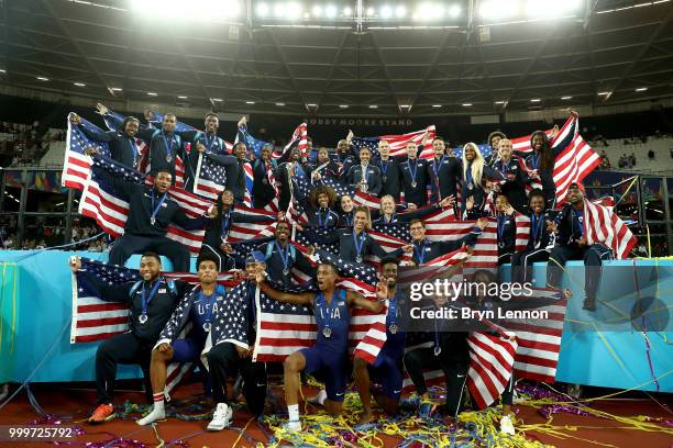 Team USA celebrate as they lift the platinum trophy during day two of the Athletics World Cup London at the London Stadium on July 15, 2018 in...