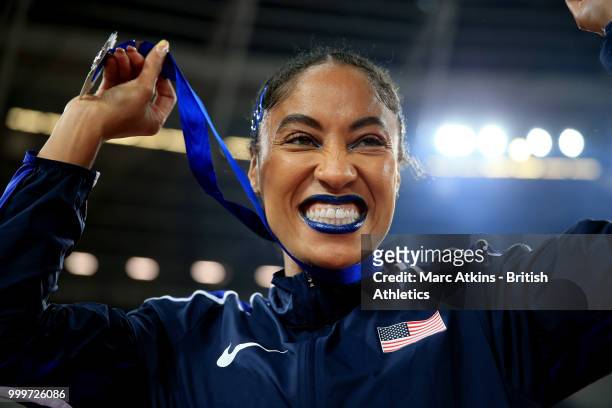 Captain Queen Harrison celebrates with her medal as Team USA celebrate victory during day two of the Athletics World Cup London at the London Stadium...