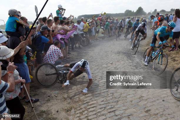 Team Sky rider Michal Kwiatkowski of Poland crashes at the 156.5-km of Tour de France 2018 stage 9 from Arras Citadelle to Roubaix on July 15, 2018...