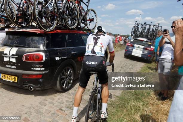 Team Sky rider Michal Kwiatkowski of Poland crashes at the 156.5-km of Tour de France 2018 stage 9 from Arras Citadelle to Roubaix on July 15, 2018...