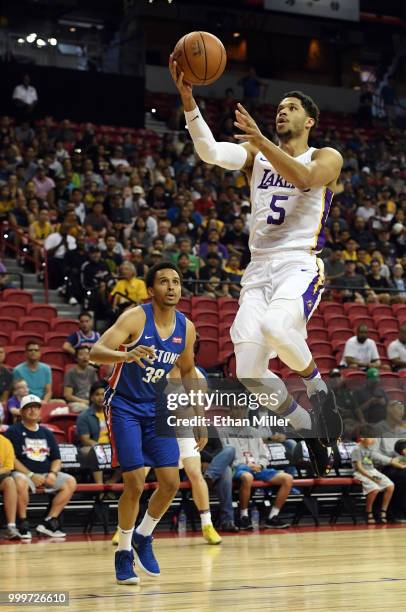 Josh Hart of the Los Angeles Lakers drives to the basket in front of Reggie Hearn of the Detroit Pistons during a quarterfinal game of the 2018 NBA...