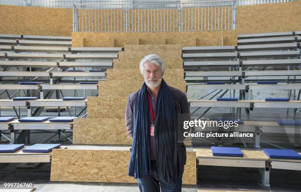 Chris Dercon, artistic director of the Berliner Volksbuehne theatre, explains the plans for a 'Satellitentheater' of the Volksbuehne in a hangar of...