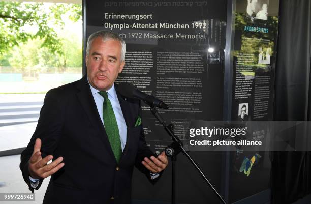Ludwig Spaenle, Minister of Education in Bavaria , explains an information board at the memorial site for the 1972 Munich massacre of the Israeli...