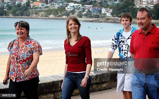 Young round-the-world sailor, Jessica Watson, walks with her father, Roger Watson, along with family and supporters including fellow English teenage...