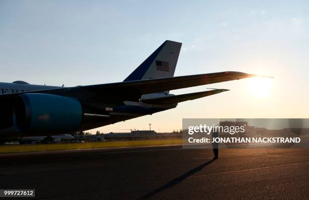 Soldier stands in front of the Air Force One upon arrival at Helsinki-Vantaa Airport in Helsinki, on July 15, 2018 on the eve of a summit in Helsinki...