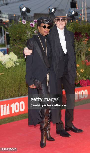 Marius Mueller-Westernhagen and Lindiwe Suttle arrive at the "BILD100" summer reception in Berlin, 04 September 2017. 100 of the most important...