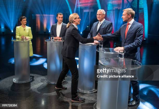 Dpatop - Alice Weidel greets Christian Lindner before the tv-"heptathlon" with Sarah Wagenknecht , Cem Oezdemir and Joachim Herrmann in a studio in...