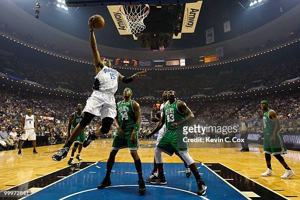 Vince Carter of the Orlando Magic drives for a shot attempt against Paul Pierce and Kendrick Perkins of the Boston Celtics in Game Two of the Eastern...