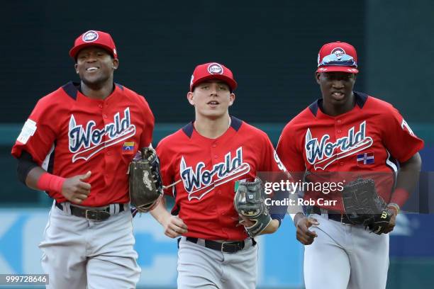 Luis Basabe of the Chicago White Sox and the World Team, Leody Taveras of the Texas Rangers and the World Team and Jesus Sanchez of the Tampa Bay...