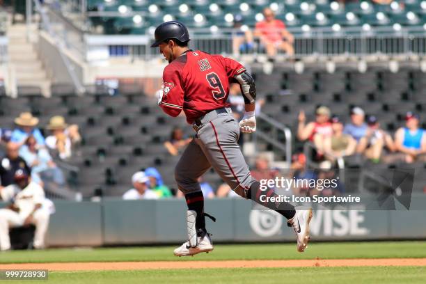 Arizona Diamondbacks Outfielder Jon Jay hits a homerun to score the only D-Backs run during the MLB game between the Arizona Diamondbacks and the...