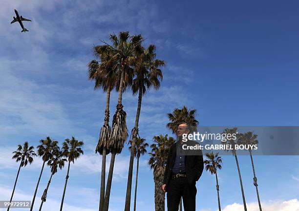 French author Jean Rolin poses in Los Angeles, California on May 18, 2010. Jean Rolin is a French writer and journalist. He received the Albert...