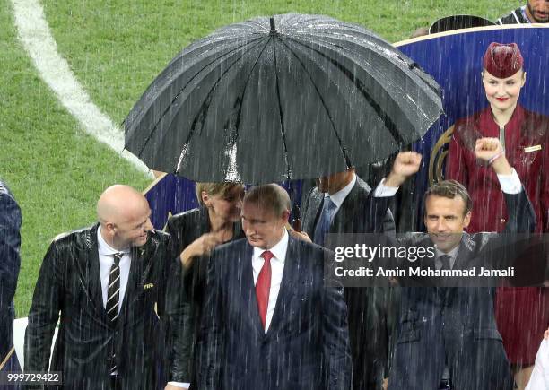 Russian President Vladimir Putin , French President Emmanuel Macron and FIFA President Gianni Infantino attend the award ceremony of the 2018 FIFA...