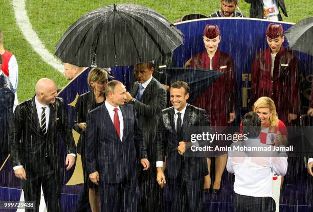 Russian President Vladimir Putin , French President Emmanuel Macron and FIFA President Gianni Infantino attend the award ceremony of the 2018 FIFA...