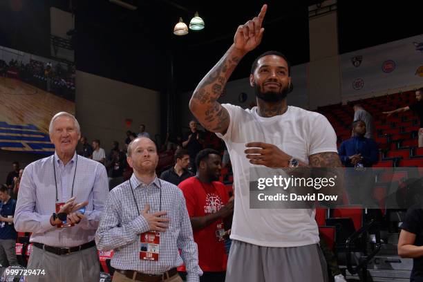 Mike Scott of the LA Clippers acknowledges crowd next to NBA Legend Jerry West and Executive Vice President Lawrence Frank of the LA Clippers before...