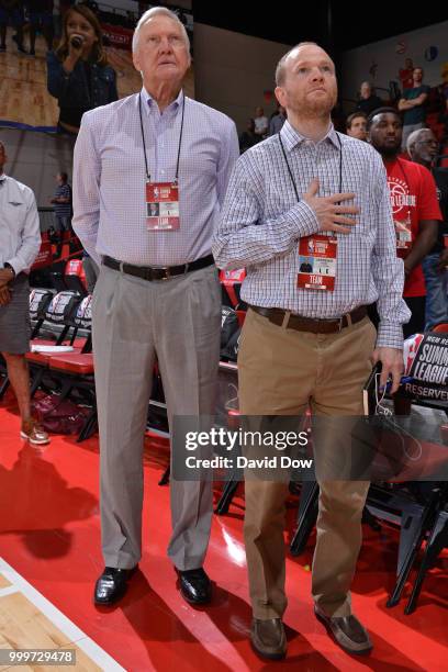 Legend Jerry West and Executive Vice President Lawrence Frank of the LA Clippers stand for the national anthem before the game between LA Clippers...