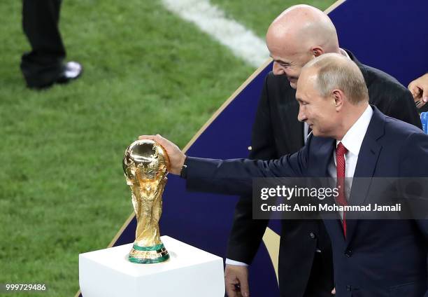 Russian President Vladimir Putin and FIFA President Gianni Infantino attend the award ceremony of the 2018 FIFA World Cup Russia Final between France...