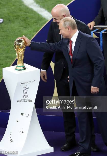 Russian President Vladimir Putin and FIFA President Gianni Infantino attend the award ceremony of the 2018 FIFA World Cup Russia Final between France...