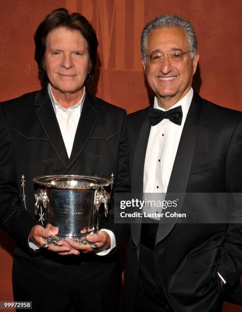 Musician John Fogerty and BMI President and CEO Del Bryant attends the 58th Annual BMI Pop Awards held at the Beverly Wilshire hotel on May 18, 2010...