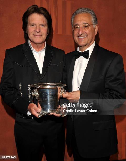 Musician John Fogerty and BMI President and CEO Del Bryant attends the 58th Annual BMI Pop Awards held at the Beverly Wilshire hotel on May 18, 2010...