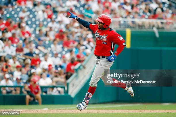 Yusniel Diaz of the Los Angeles Dodgers and the World Team rounds the bases after hitting a two-run home run in the fifth inning against the U.S....