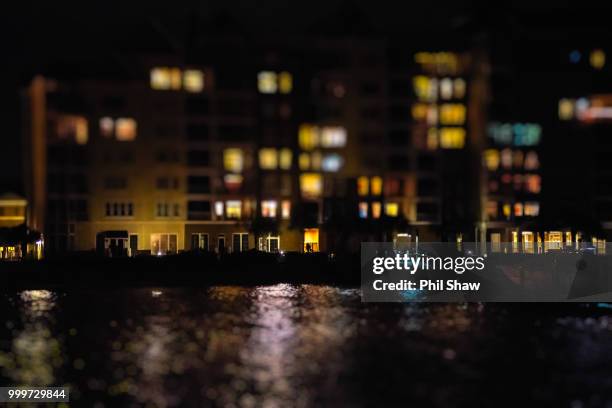 night time across the water - shaw stock pictures, royalty-free photos & images