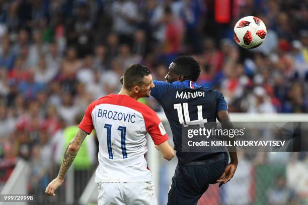 Croatia's midfielder Marcelo Brozovic vies with France's midfielder Blaise Matuidi during the Russia 2018 World Cup final football match between...