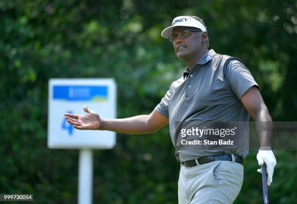 Vijay Singh reacts to his tee shot on the fourth hole during the final round of the PGA TOUR Champions Constellation SENIOR PLAYERS Championship at...