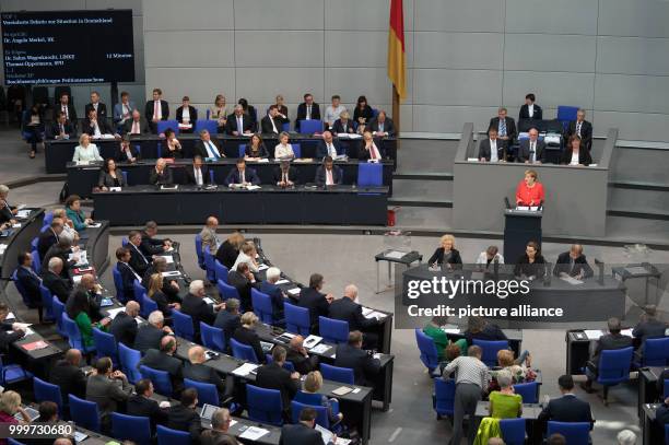 German chancellor Angela Merkel speaks during the last official meeting day of the German parliament before the elections 2017, in Berlin, Germany, 5...