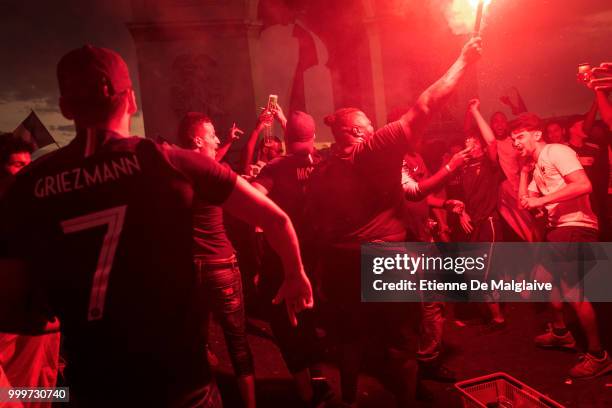 French supporters celebrates France's victory against Croatia in 2018 World Cup final in Place de l'Etoile on July 15, 2018 in PARIS, France.