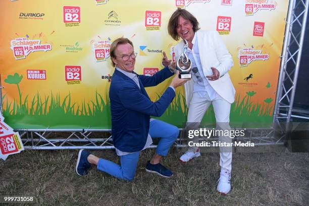 Wolfgang Lippert and Juergen Drews during the Radio B2 SchlagerHammer Open-Air-Festival at Hoppegarten on July 15, 2018 in Berlin, Germany.