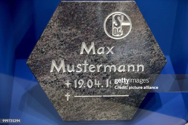 An exemplary gravestone for fans of the soccer club FC Schalke 04 can be seen at the House of History in Bonn, Germany, 5 September 2017. The...