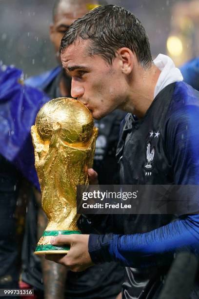 Antoine Griezmann of France celebrates with the trophy after the 2018 FIFA World Cup Russia Final between France and Croatia at Luzhniki Stadium on...