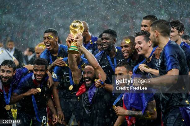 Adil Rami of France celebrates with the trophy after the 2018 FIFA World Cup Russia Final between France and Croatia at Luzhniki Stadium on July 15,...