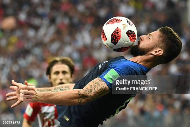France's forward Olivier Giroud controls the ball during the Russia 2018 World Cup final football match between France and Croatia at the Luzhniki...